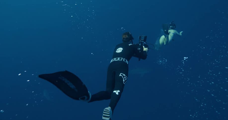 Woman diving in ocean