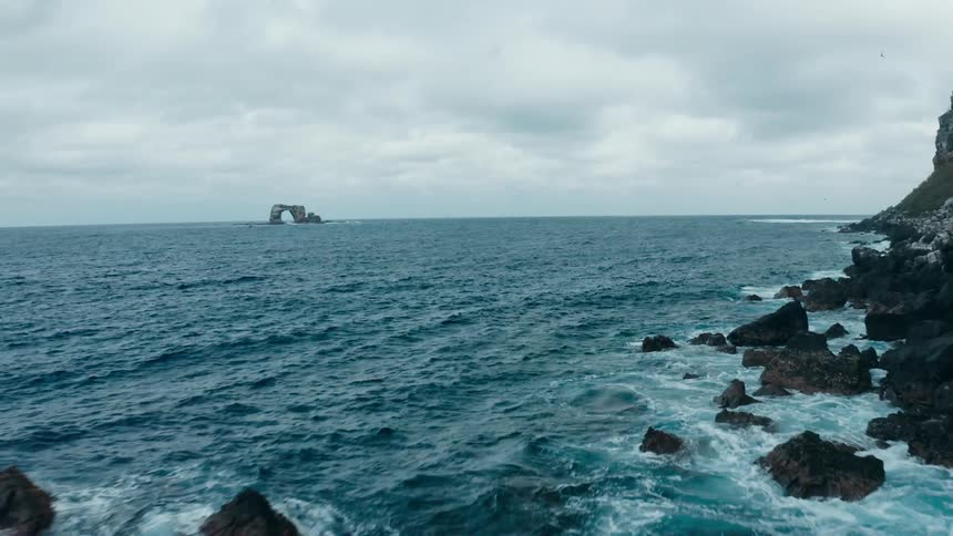 Aerial view of rocky coast of island on a cloudy day