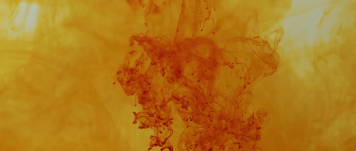 Flowing yellow and red liquid