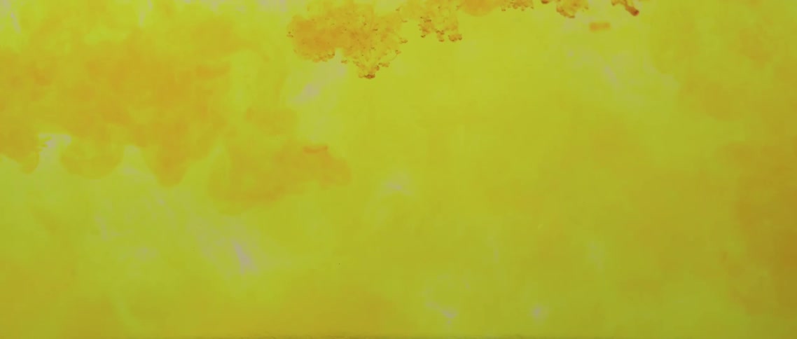 Yellow white and brown colors that look like paint and water