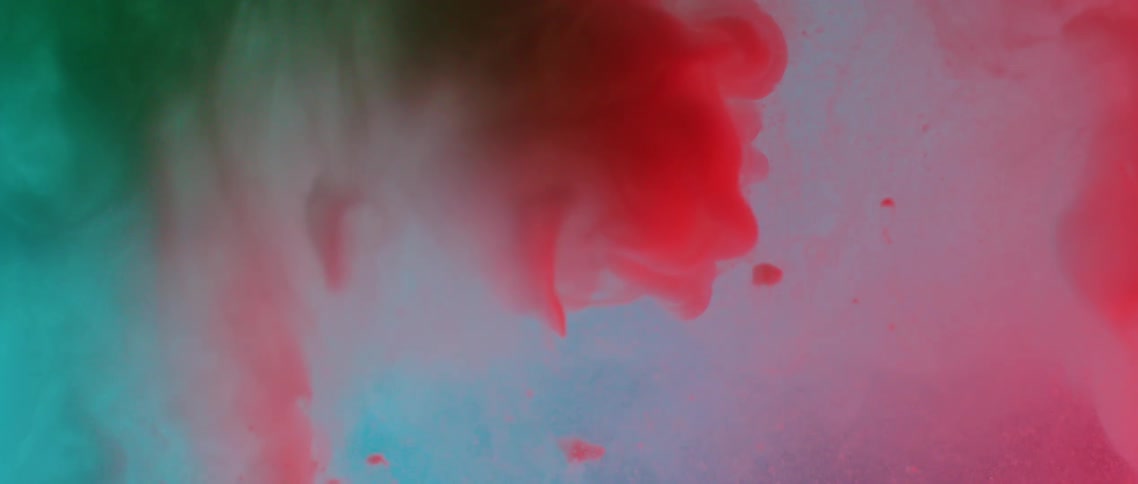 Flowing red and blue liquid