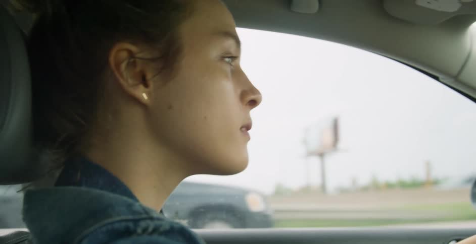 A person driving a car