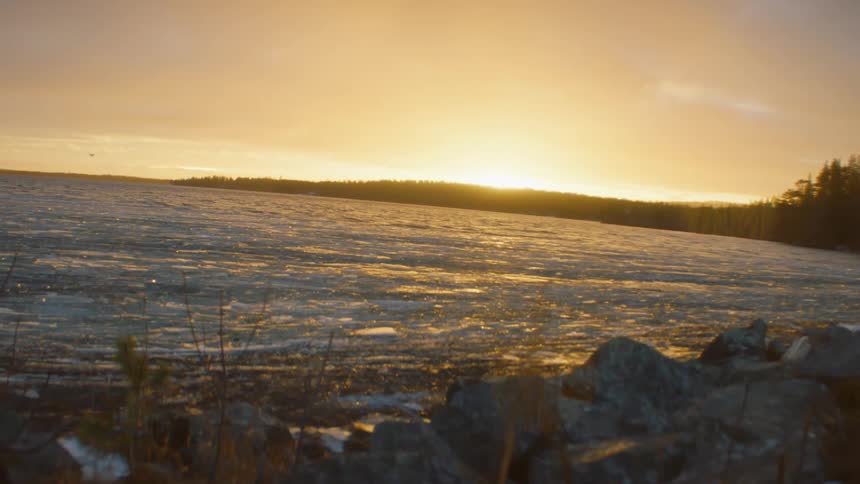 Sunrise over frozen water