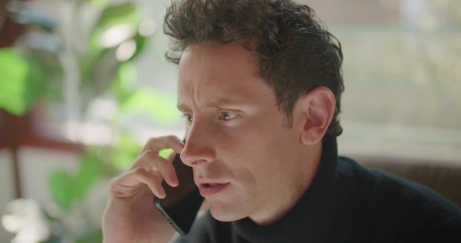 A man talking on a smartphone