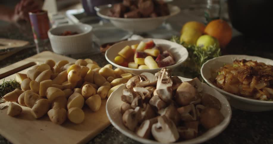 Chopped vegetables over the kitchen table at home
