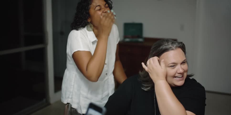 Two friends are taking a picture together