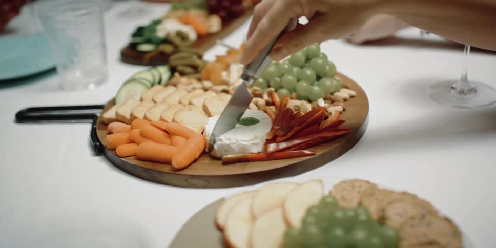 A person is cutting food with a knife