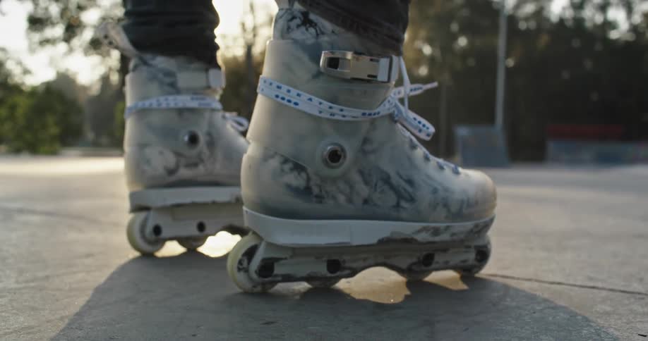 A person wearing roller blades standing outdoors