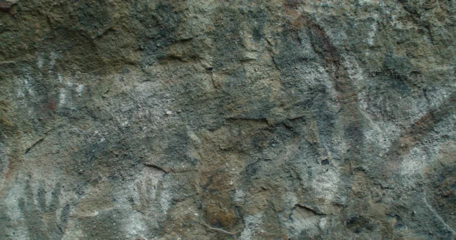 Cave drawings on a rock wall