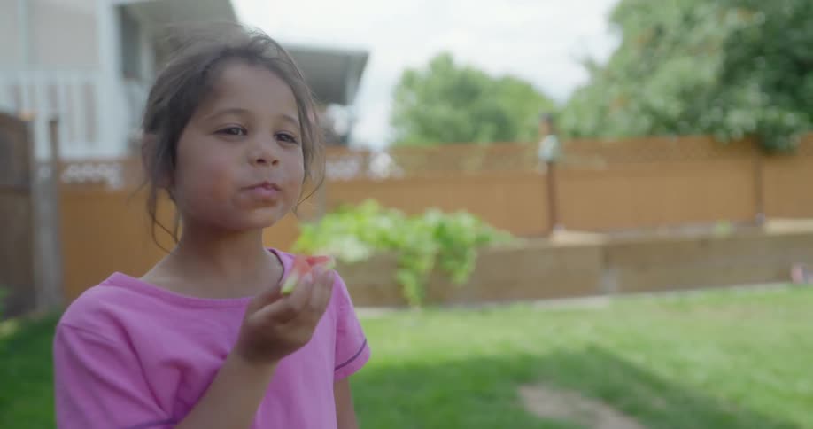 Child eating watermelon