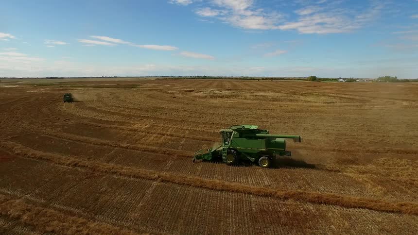 Large farm machine working in a field