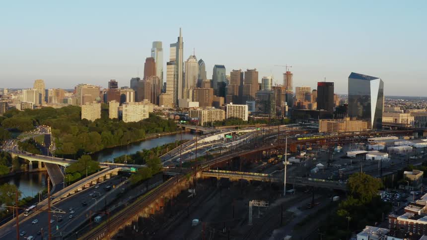 A freeway running through a metropolis on a sunny day