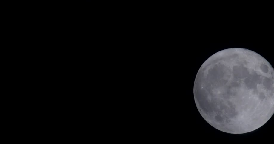 The moon is displayed in the universe at night