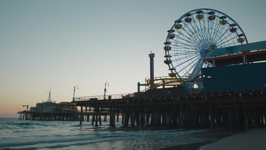 A ferris wheel on a boardwalk