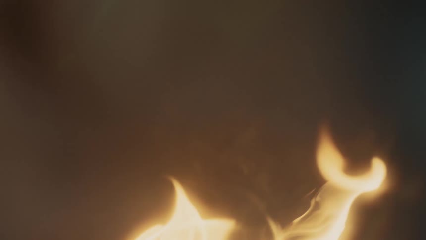Flames grow larger as a battery pack burns