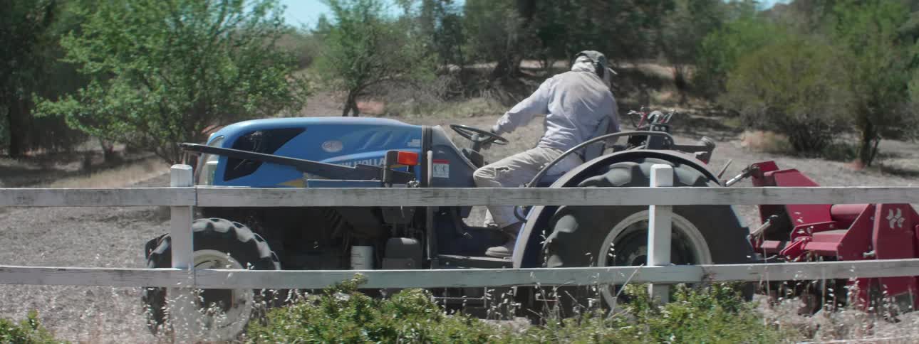 Man driving tractor