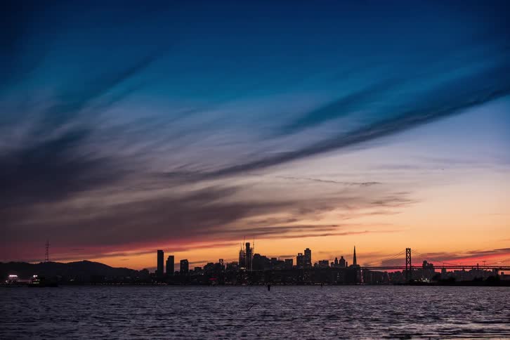 Time lapse of a colorful sky over a large city