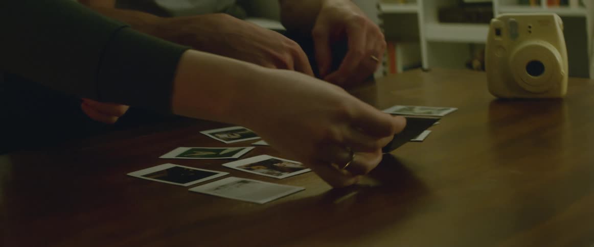 People sorting through photographs