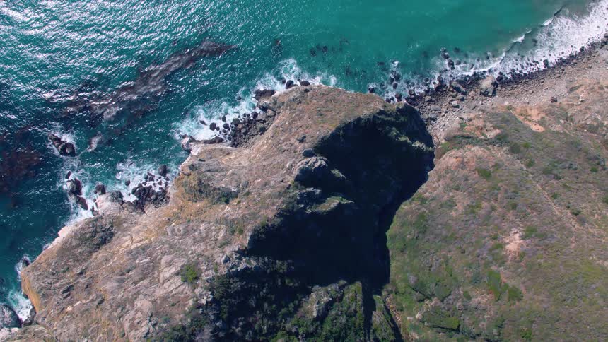 An aerial shot of a cliffside