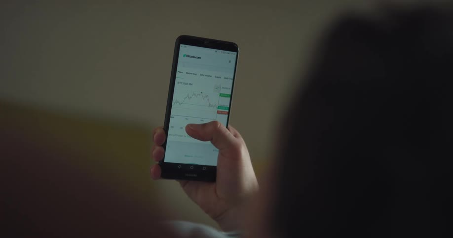 A person is browsing on their cell phone