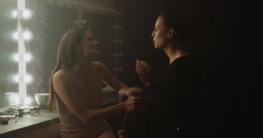 A woman bursts in to a teenagers dressing room and gives her praise