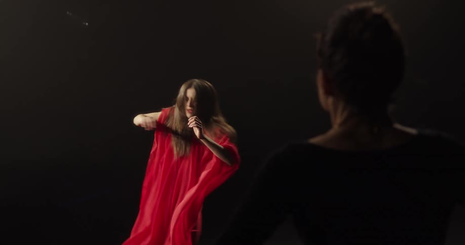 Female dancing and being critiqued