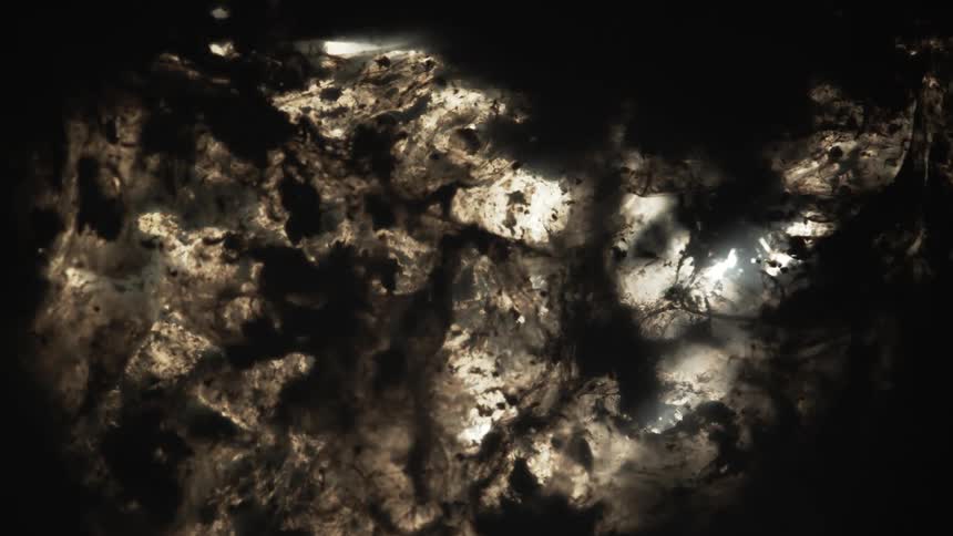 Abstract colors swirl in dark water