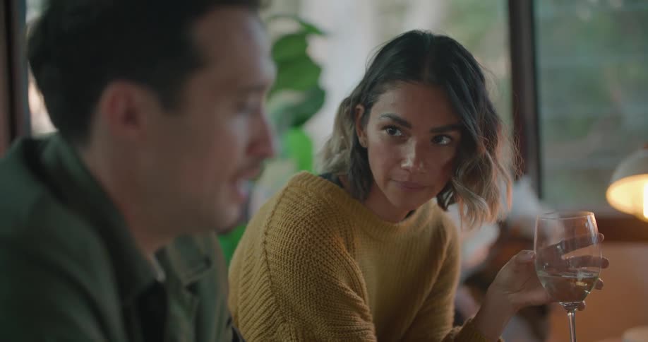 Woman talking to man