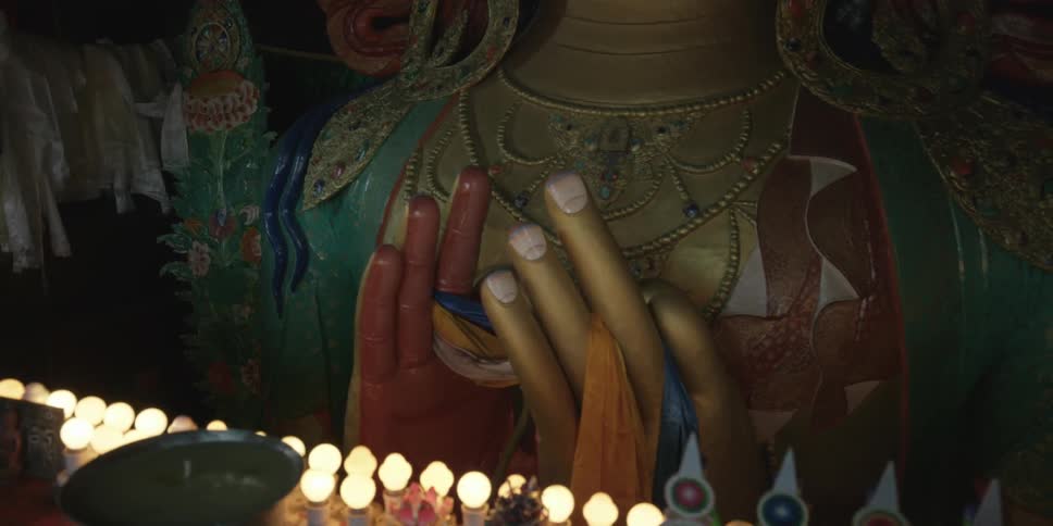 Close up of a statue with lights around it