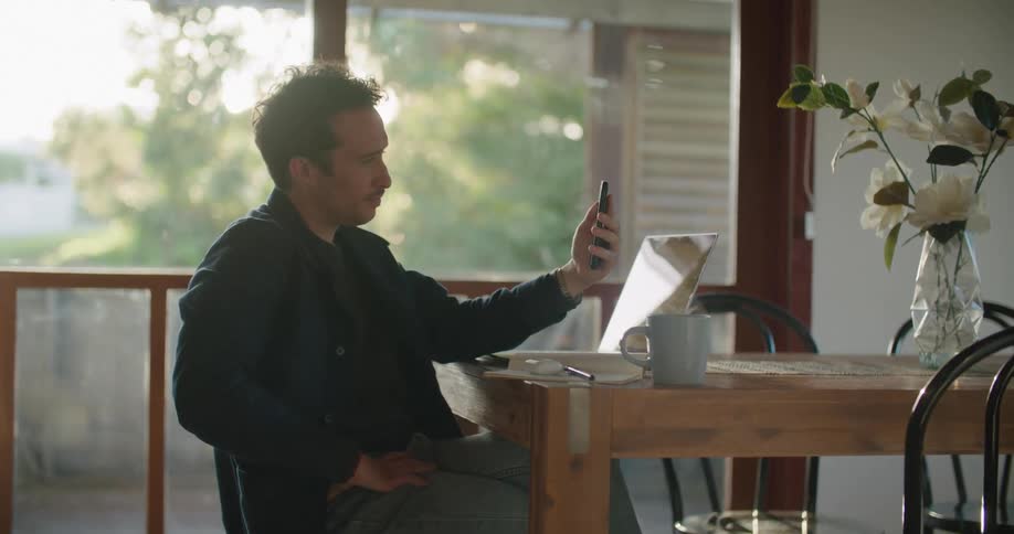 Human looking at phone