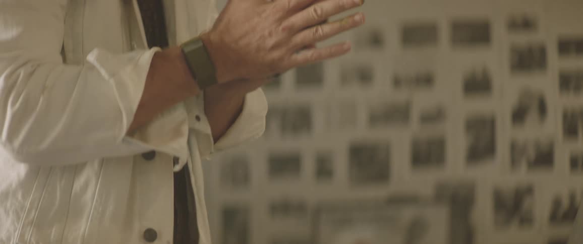 Man looking at painting