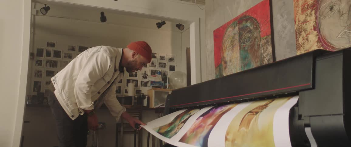 A man is making creative arts in his house