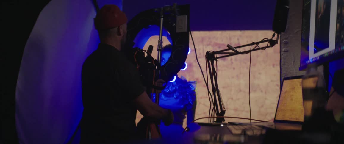 A man conducting a photo shoot