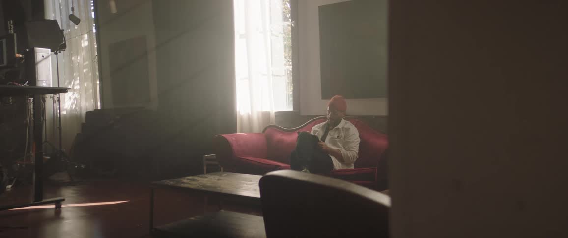 Person sitting on couch