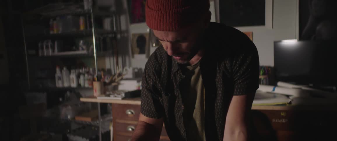 A painter working in a studio