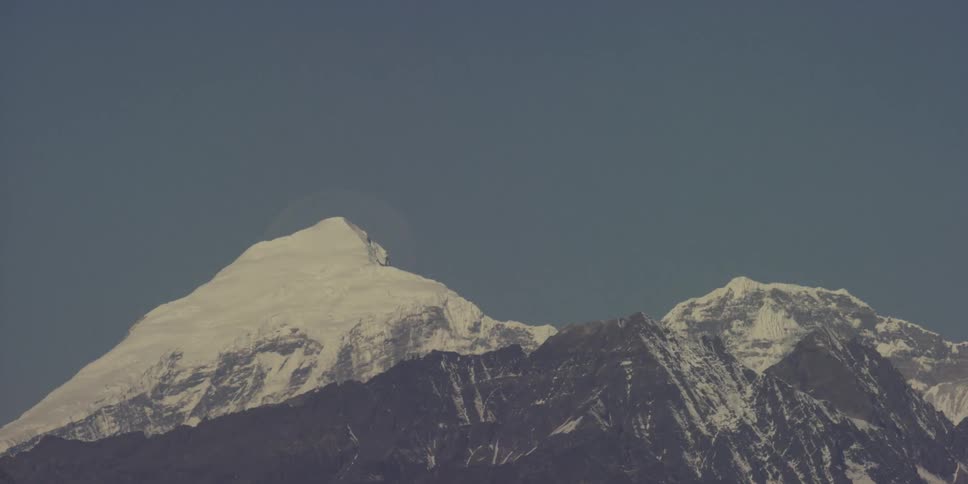 View of the tops of snow covered mountains