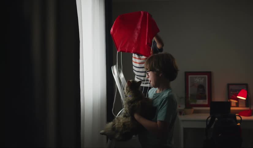 Two kids playing in a house