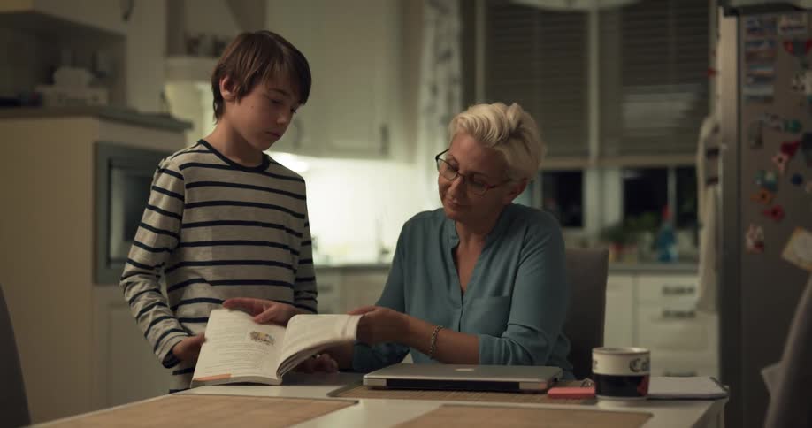 Mother reading to son