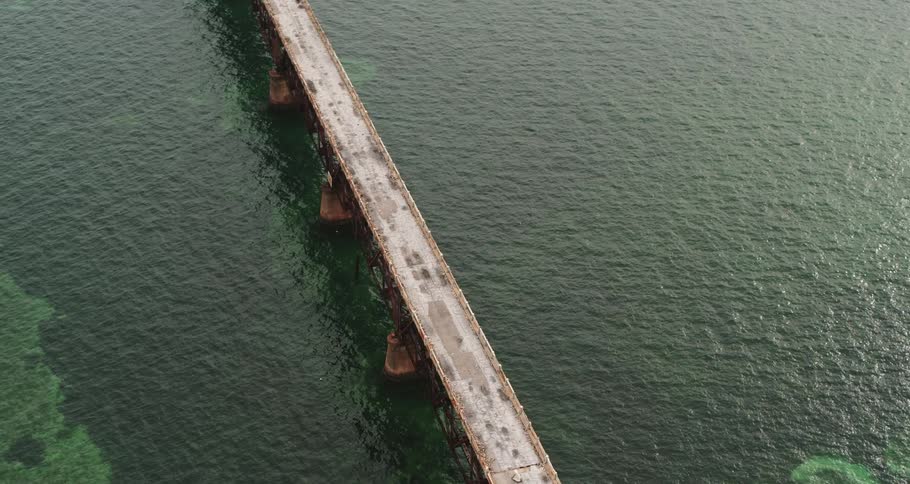 An aerial view of a bridge over a waterway
