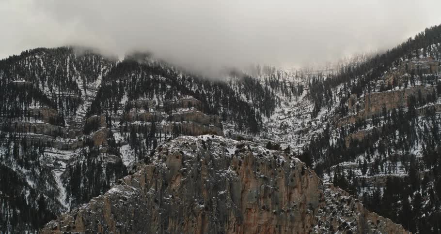 Fog is rolling over the mountain range