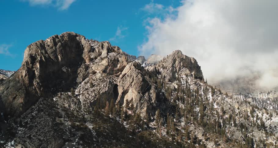Clouds moving over a mountain range