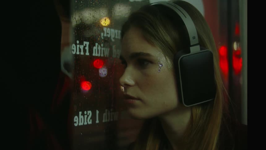 Woman looking at window