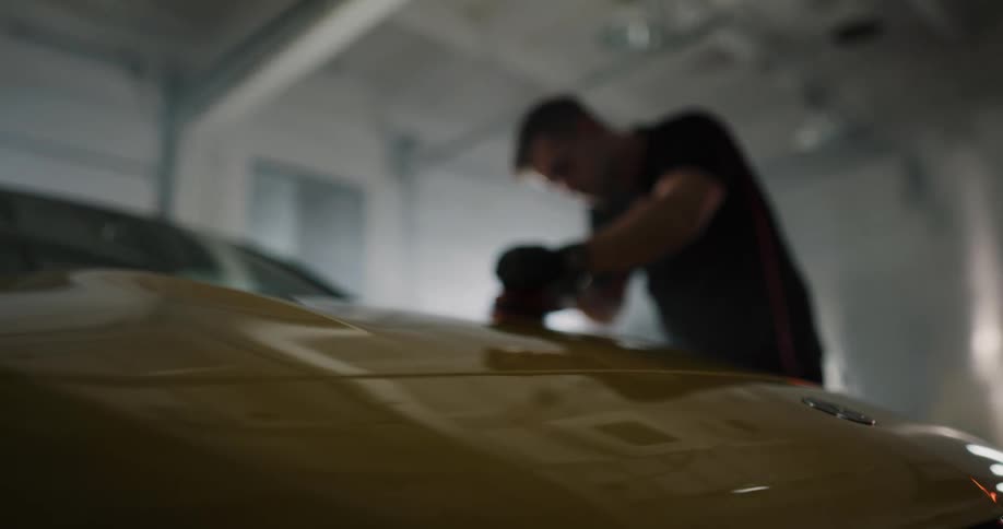 Man cleaning car