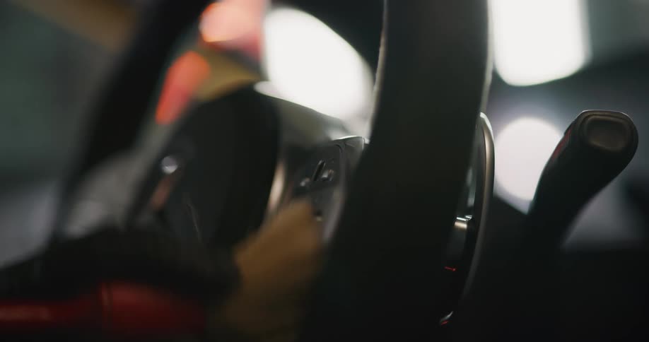 Someone cleaning car
