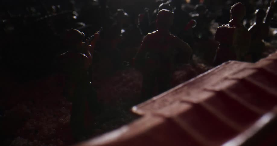 A view of toy soldiers out in the dirt