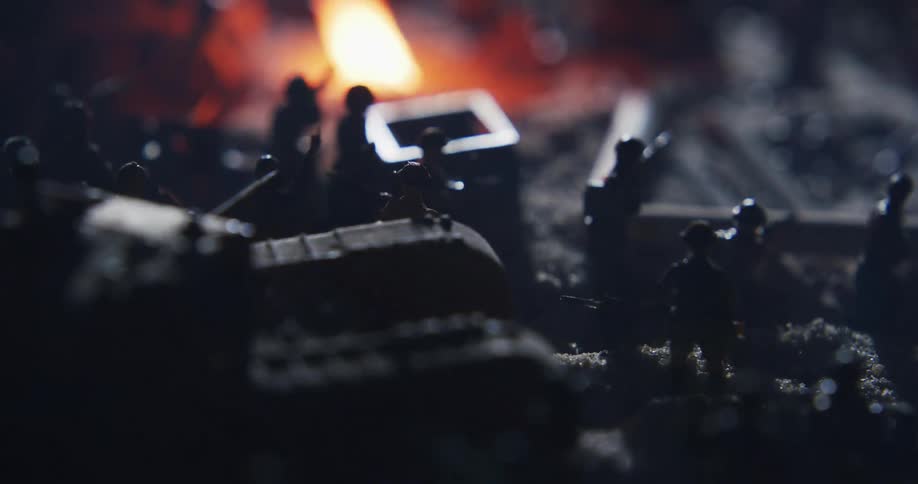 Toy army men with smoke and fire