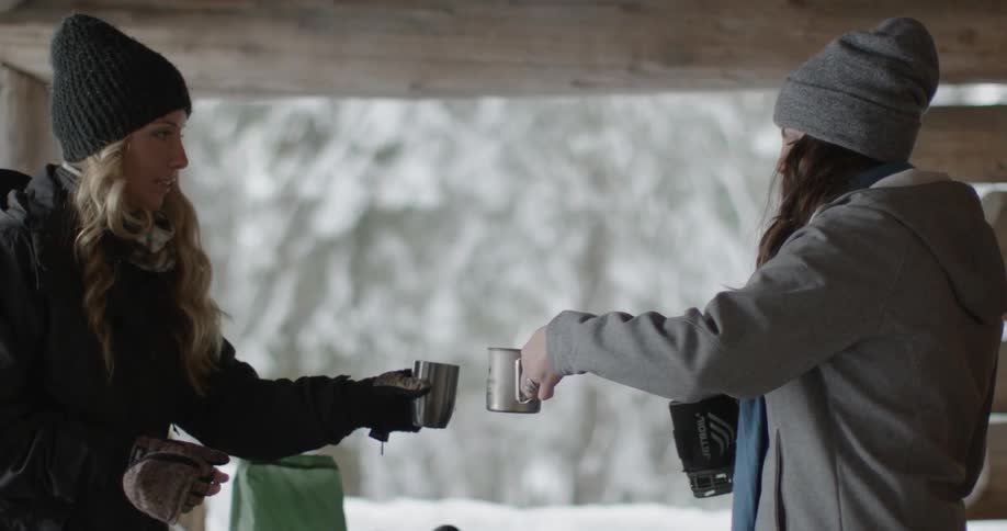 People enjoying a warm drink outdoors