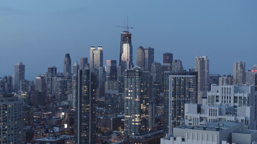 The sun is setting on Chicago