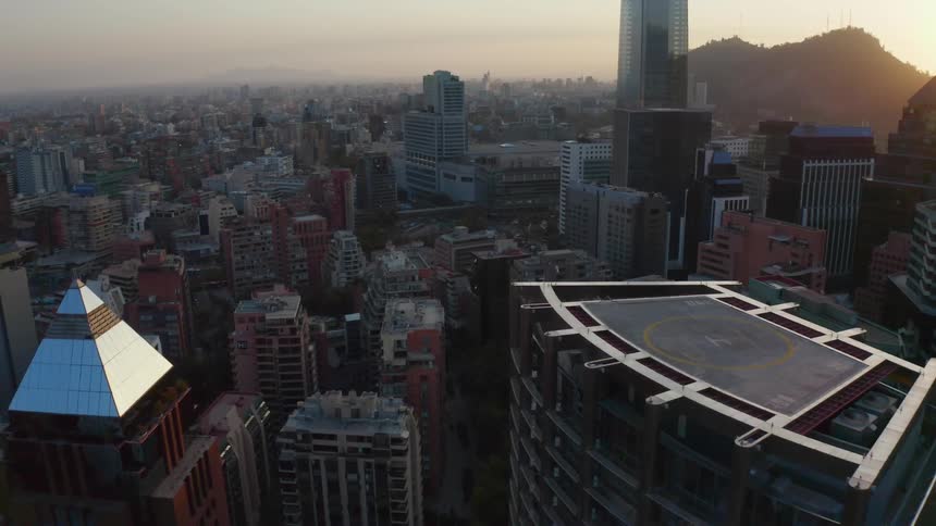 Aerial view of a downtown city is displayed