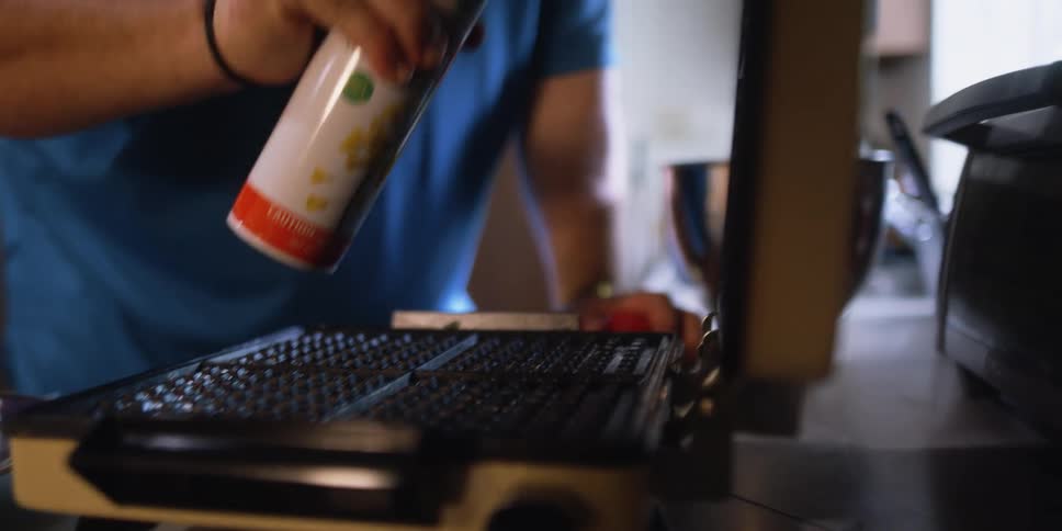 Human spraying oil